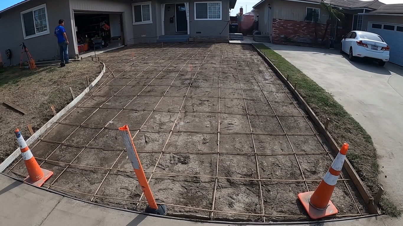Proper driveway preparation with rebar reinforcement in Tustin, CA